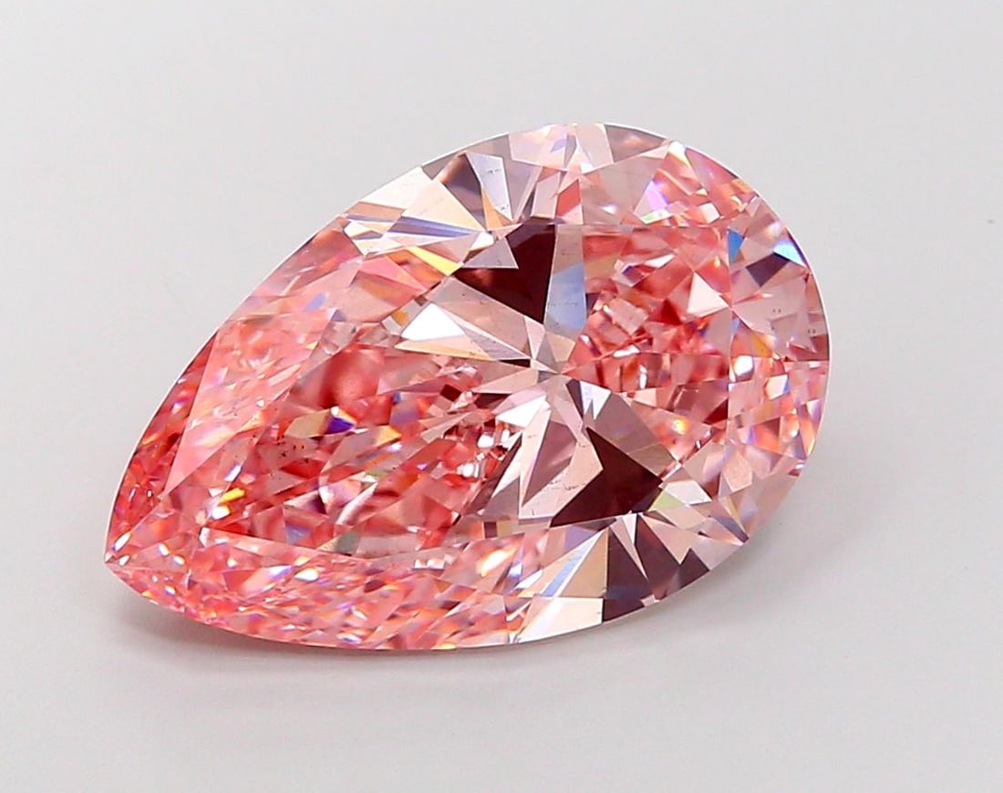 Loose Diamond - PEAR 10.23ct Fancy Vivid Pink VS2: Loose Diamond - PEAR 10.23ct Fancy Vivid Pink VS2 Source: This is a real non-mined Diamond that has been grown in a lab Shape: PEAR Carats: 10.23 Color: Fancy Vivid Pink Certification: IGI Video: