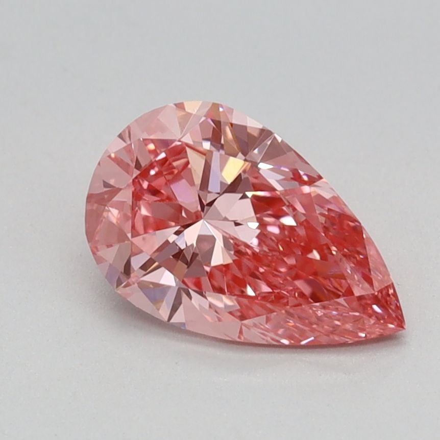 Loose Diamond - PEAR 0.76ct Fancy Vivid Pink VVS2: Loose Diamond - PEAR 0.76ct Fancy Vivid Pink VVS2 Source: This is a real non-mined Diamond that has been grown in a lab Shape: PEAR Carats: 0.76 Color: Fancy Vivid Pink Certification: IGI Video: