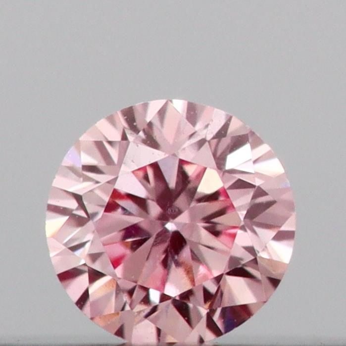 Loose Diamond - ROUND 0.09ct Fancy Intense Pink VS1: Loose Diamond - ROUND 0.09ct Fancy Intense Pink VS1 Source: This is a real non-mined Diamond that has been grown in a lab Shape: ROUND Carats: 0.09 Color: Fancy Intense Pink Certification: IGI Video: