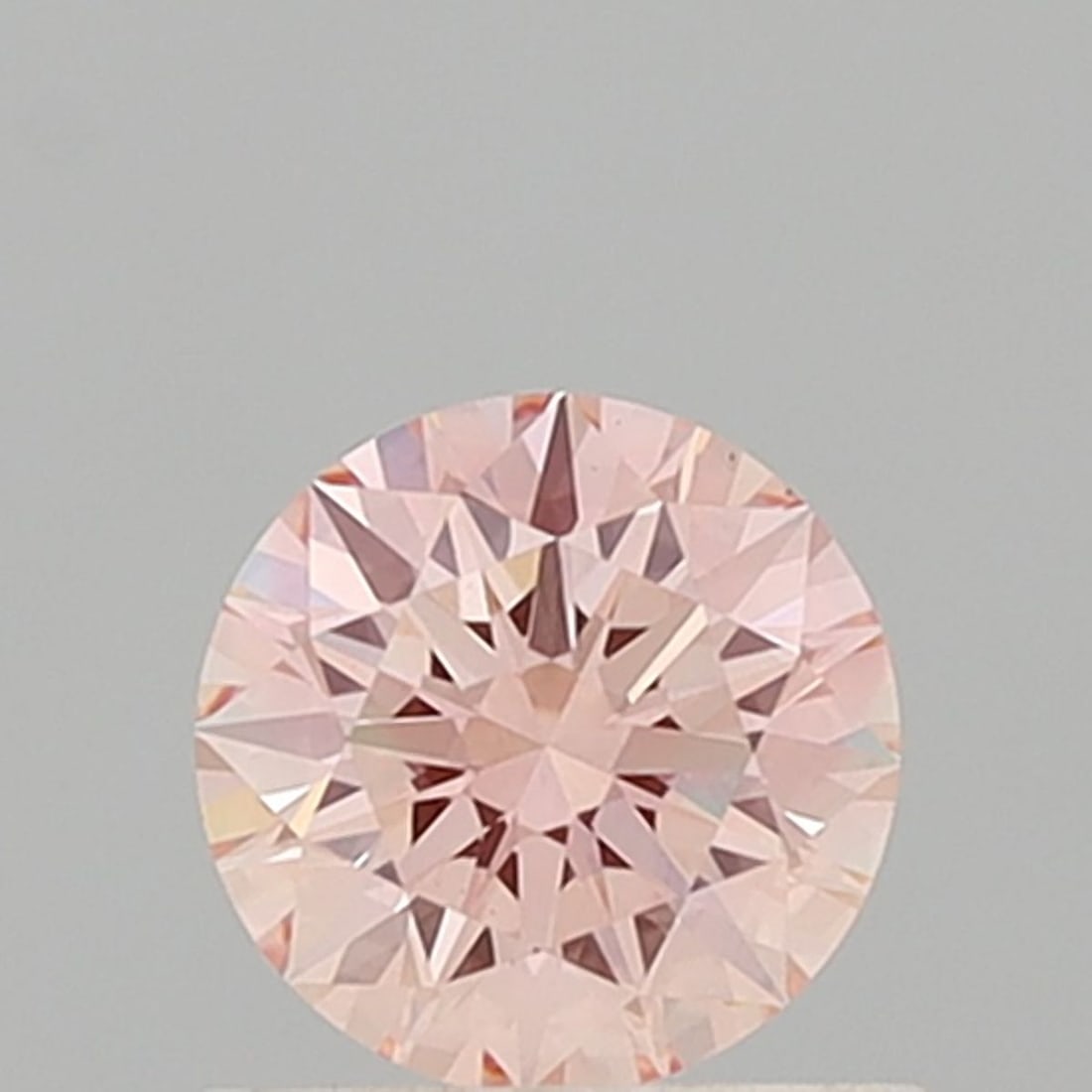 Ideal Loose Diamond - ROUND 0.72ct Fancy Pink VS1: Ideal Loose Diamond - ROUND 0.72ct Fancy Pink VS1 Source: This is a real non-mined Diamond that has been grown in a lab Shape: ROUND Carats: 0.72 Color: Fancy Pink Certification: IGI Video:
