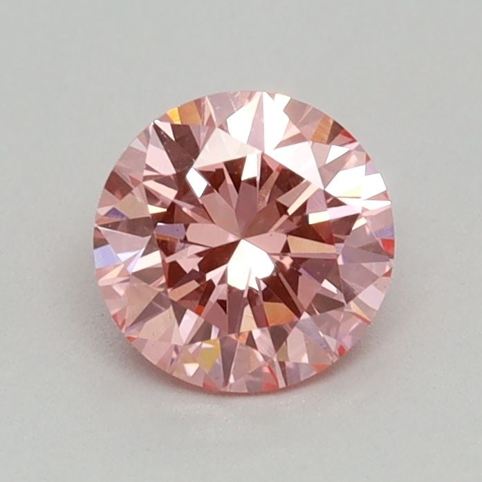 Loose Diamond - ROUND 0.4ct Fancy Vivid Pink VS1: Loose Diamond - ROUND 0.4ct Fancy Vivid Pink VS1 Source: This is a real non-mined Diamond that has been grown in a lab Shape: ROUND Carats: 0.4 Color: Fancy Vivid Pink Certification: IGI Video: