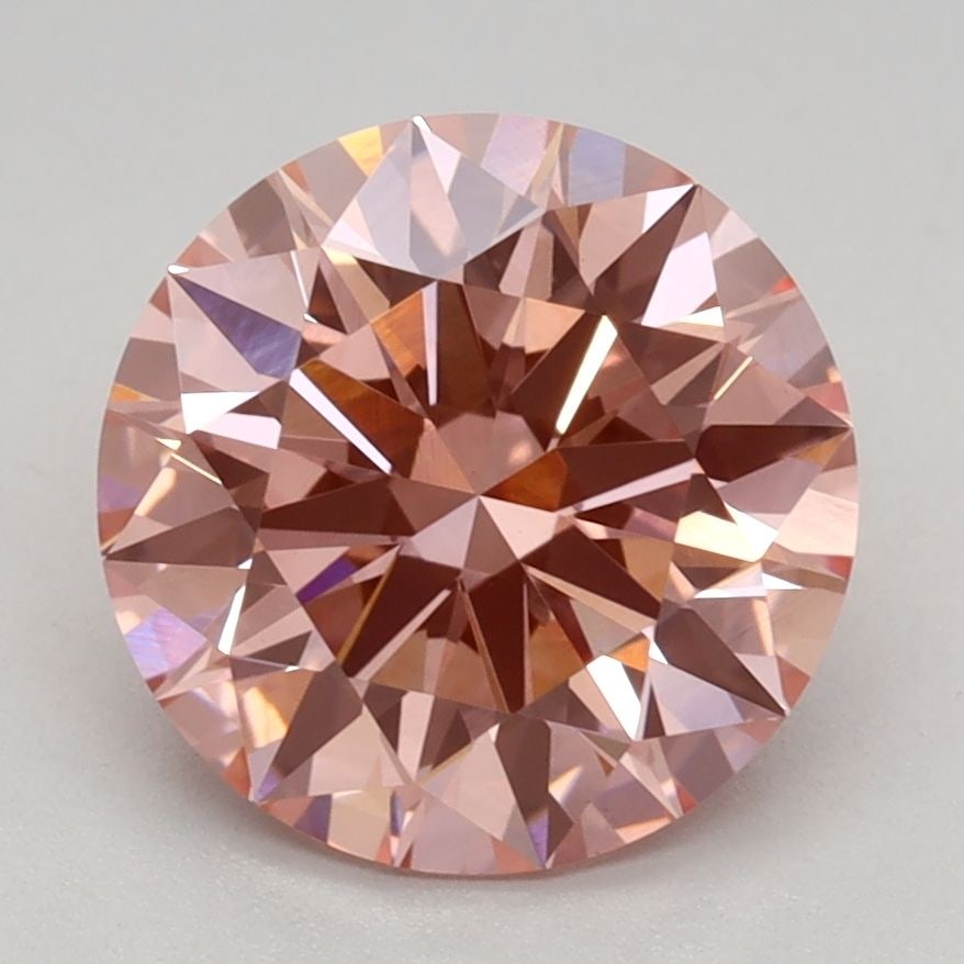 Ideal Loose Diamond - ROUND 2.1ct Fancy Vivid Pink VVS2: Ideal Loose Diamond - ROUND 2.1ct Fancy Vivid Pink VVS2 Source: This is a real non-mined Diamond that has been grown in a lab Shape: ROUND Carats: 2.1 Color: Fancy Vivid Pink Certification: IGI Video: