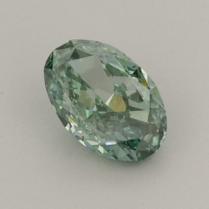 Loose Diamond - OVAL 0.64ct Fancy Vivid Green VS2: Loose Diamond - OVAL 0.64ct Fancy Vivid Green VS2 Source: This is a real non-mined Diamond that has been grown in a lab Shape: OVAL Carats: 0.64 Color: Fancy Vivid Green Certification: IGI Video:
