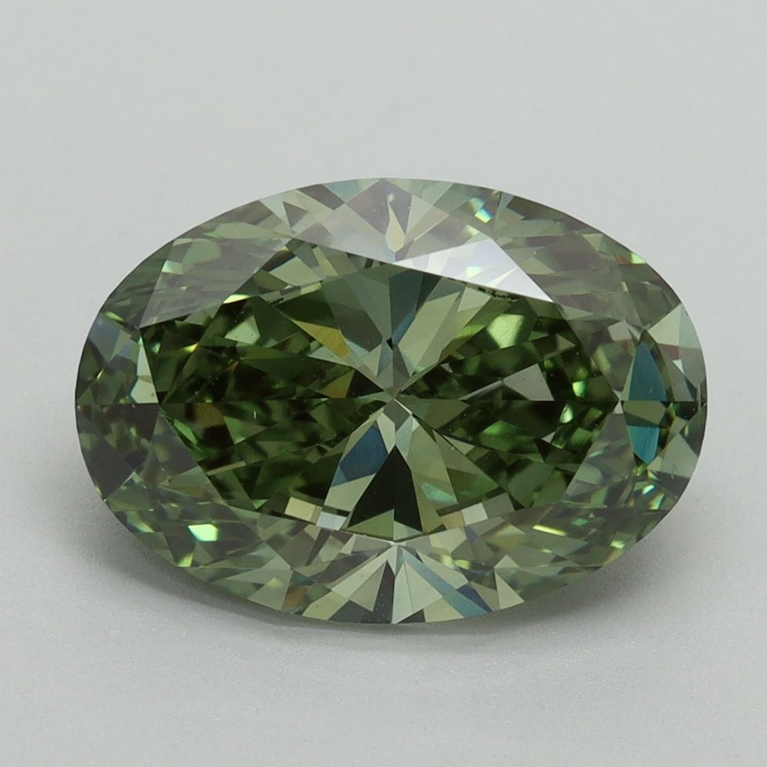Loose Diamond - OVAL 4.06ct Fancy Vivid Green VS1: Loose Diamond - OVAL 4.06ct Fancy Vivid Green VS1 Source: This is a real non-mined Diamond that has been grown in a lab Shape: OVAL Carats: 4.06 Color: Fancy Vivid Green Certification: IGI Video: