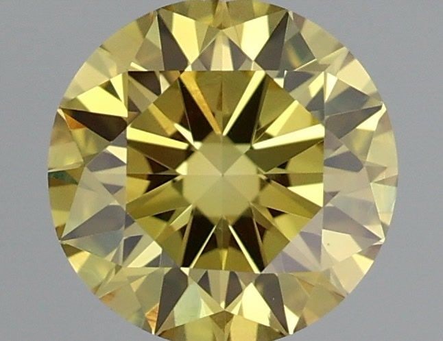 Loose Diamond - ROUND 0.5ct Fancy Vivid Yellow VS1: Loose Diamond - ROUND 0.5ct Fancy Vivid Yellow VS1 Source: This is a real non-mined Diamond that has been grown in a lab Shape: ROUND Carats: 0.5 Color: Fancy Vivid Yellow Certification: IGI Video: