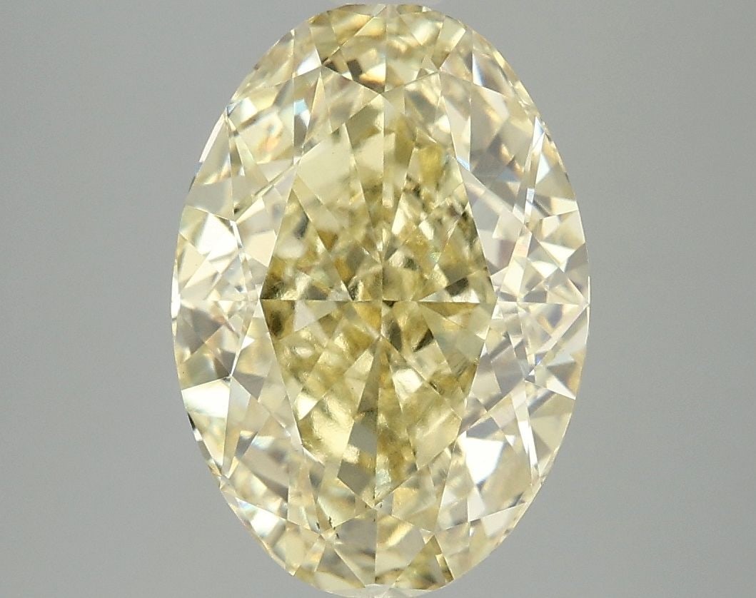 Loose Diamond - OVAL 5.02ct Fancy Vivid Yellow VS1: Loose Diamond - OVAL 5.02ct Fancy Vivid Yellow VS1 Source: This is a real non-mined Diamond that has been grown in a lab Shape: OVAL Carats: 5.02 Color: Fancy Vivid Yellow Certification: IGI Video: