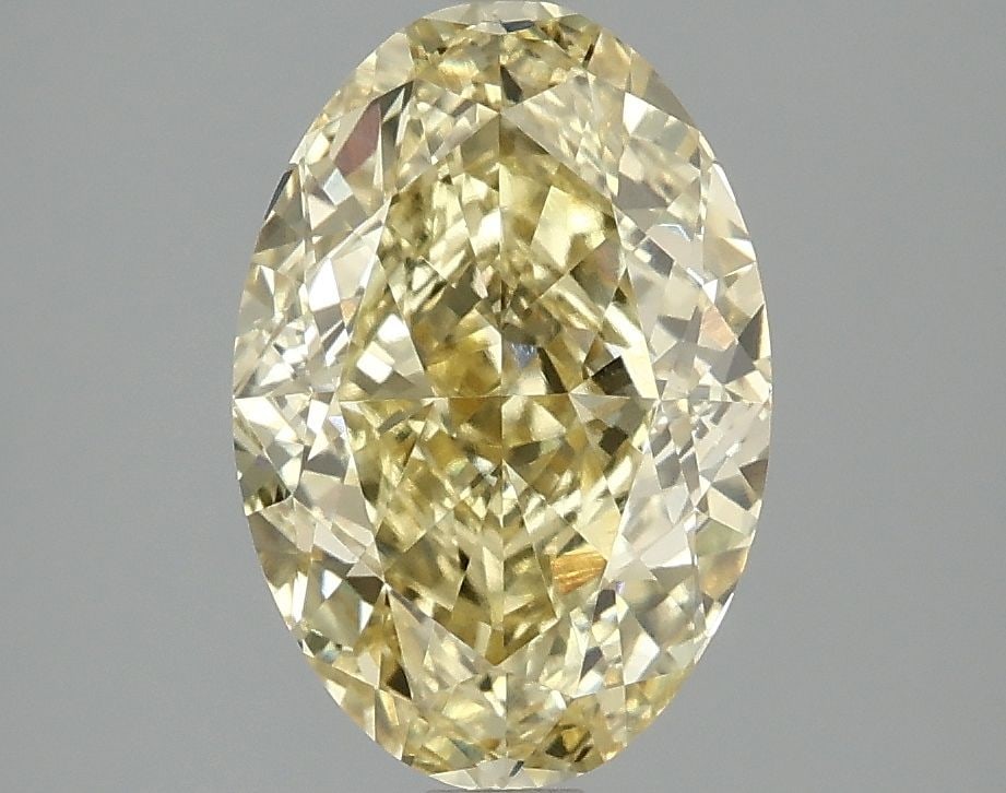 Loose Diamond - OVAL 3.01ct Fancy Vivid Yellow VS1: Loose Diamond - OVAL 3.01ct Fancy Vivid Yellow VS1 Source: This is a real non-mined Diamond that has been grown in a lab Shape: OVAL Carats: 3.01 Color: Fancy Vivid Yellow Certification: IGI Video: