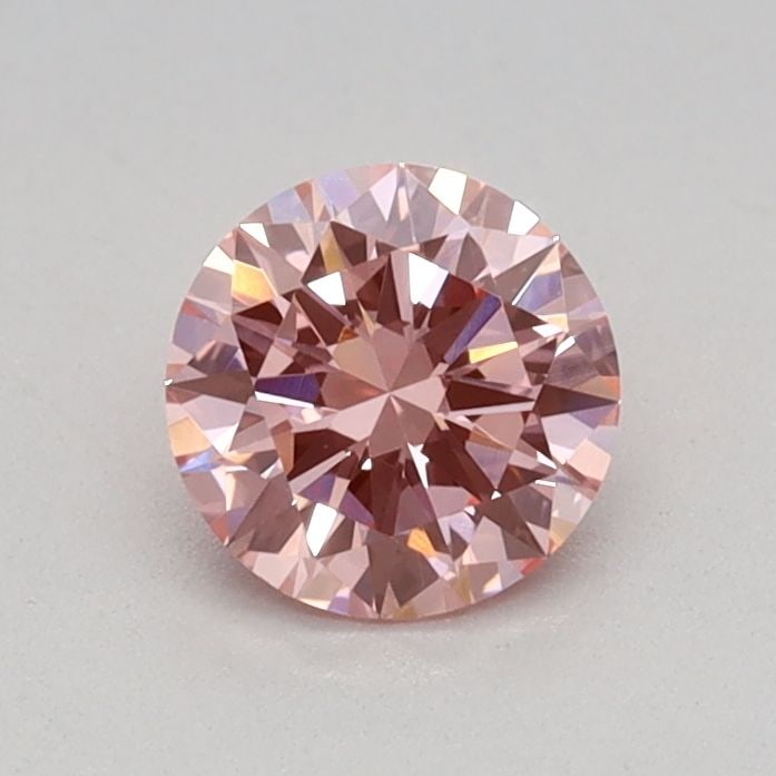 Loose Diamond - ROUND 0.4ct Fancy Vivid Pink VVS2: Loose Diamond - ROUND 0.4ct Fancy Vivid Pink VVS2 Source: This is a real non-mined Diamond that has been grown in a lab Shape: ROUND Carats: 0.4 Color: Fancy Vivid Pink Certification: IGI Video: