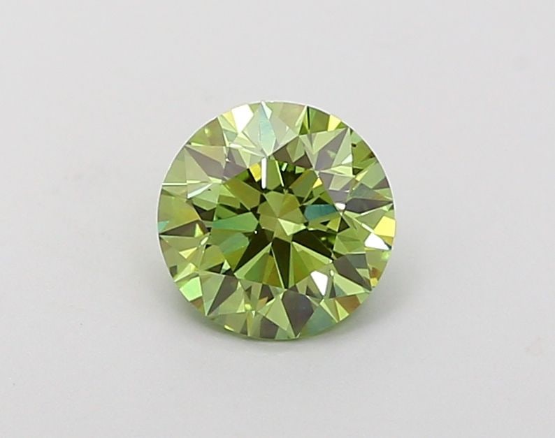 Ideal Loose Diamond - ROUND 1.01ct Fancy Vivid Green VS2: Ideal Loose Diamond - ROUND 1.01ct Fancy Vivid Green VS2 Source: This is a real non-mined Diamond that has been grown in a lab Shape: ROUND Carats: 1.01 Color: Fancy Vivid Green Certification: IGI Vid