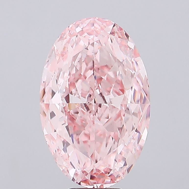 Loose Diamond - OVAL 12.01ct Fancy Intense Pink VS1: Loose Diamond - OVAL 12.01ct Fancy Intense Pink VS1 Source: This is a real non-mined Diamond that has been grown in a lab Shape: OVAL Carats: 12.01 Color: Fancy Intense Pink Certification: IGI Video: