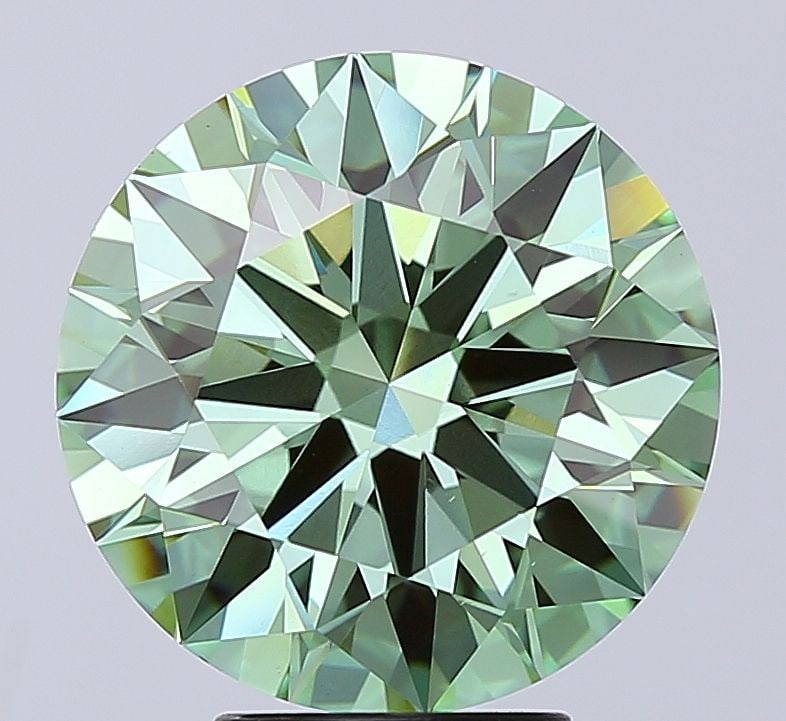 Ideal Loose Diamond - ROUND 5.1ct Fancy Vivid Green VS1: Ideal Loose Diamond - ROUND 5.1ct Fancy Vivid Green VS1 Source: This is a real non-mined Diamond that has been grown in a lab Shape: ROUND Carats: 5.1 Color: Fancy Vivid Green Certification: IGI Video