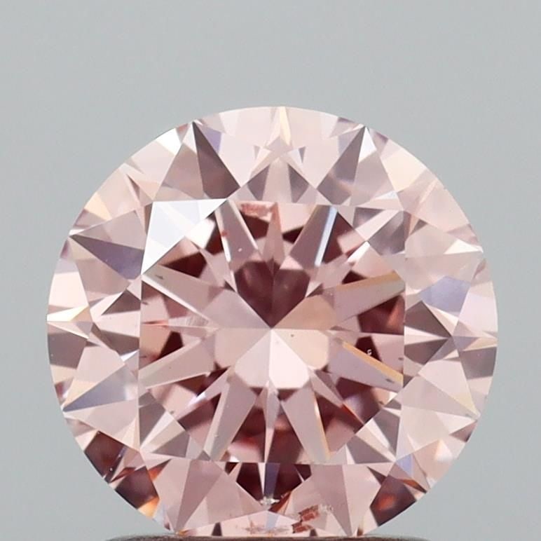 Loose Diamond - ROUND 1.5ct Fancy Intense Pink SI1: Loose Diamond - ROUND 1.5ct Fancy Intense Pink SI1 Source: This is a real non-mined Diamond that has been grown in a lab Shape: ROUND Carats: 1.5 Color: Fancy Intense Pink Certification: IGI Video: