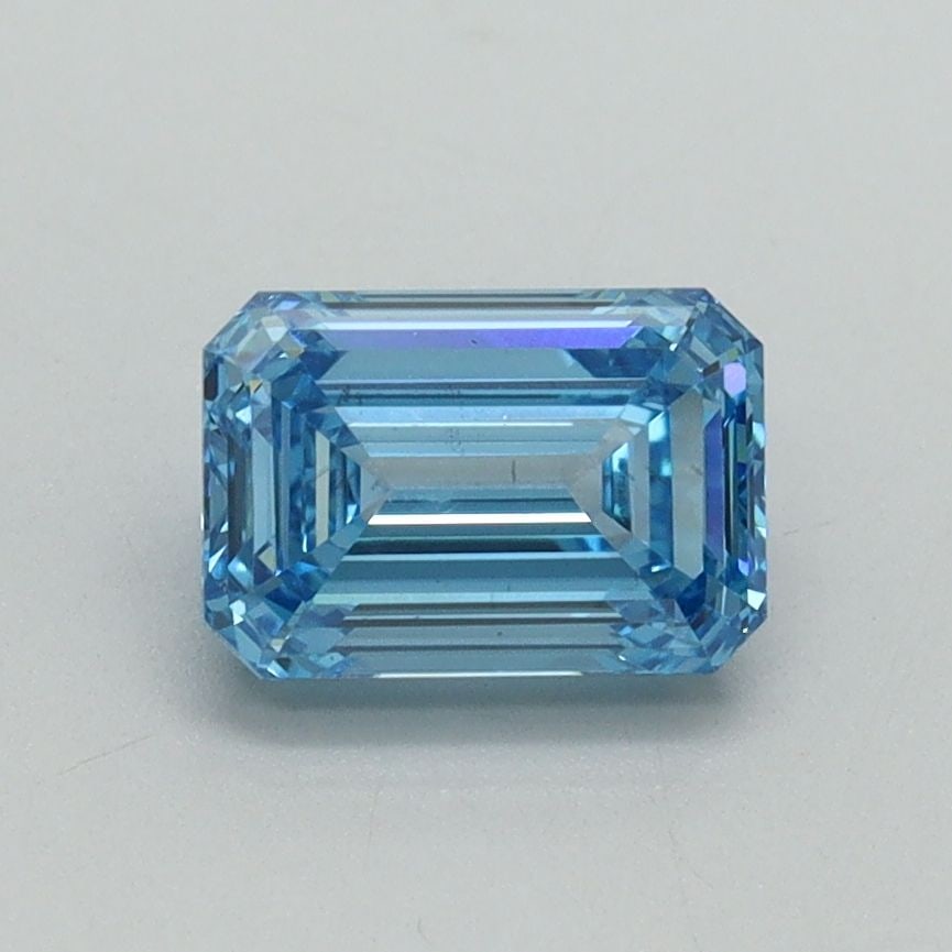 Loose Diamond - EMERALD 1.06ct Fancy Vivid Blue VS2: Loose Diamond - EMERALD 1.06ct Fancy Vivid Blue VS2 Source: This is a real non-mined Diamond that has been grown in a lab Shape: EMERALD Carats: 1.06 Color: Fancy Vivid Blue Certification: IGI Video: