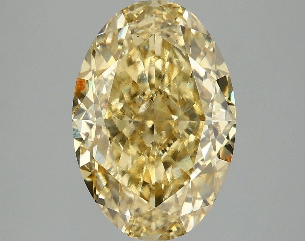 Loose Diamond - OVAL 4.09ct Fancy Intense Yellow VS1: Loose Diamond - OVAL 4.09ct Fancy Intense Yellow VS1 Source: This is a real non-mined Diamond that has been grown in a lab Shape: OVAL Carats: 4.09 Color: Fancy Intense Yellow Certification: IGI Video