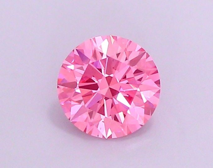 Ideal Loose Diamond - ROUND 1.23ct Fancy Vivid Pink VS2: Ideal Loose Diamond - ROUND 1.23ct Fancy Vivid Pink VS2 Source: This is a real non-mined Diamond that has been grown in a lab Shape: ROUND Carats: 1.23 Color: Fancy Vivid Pink Certification: IGI Video