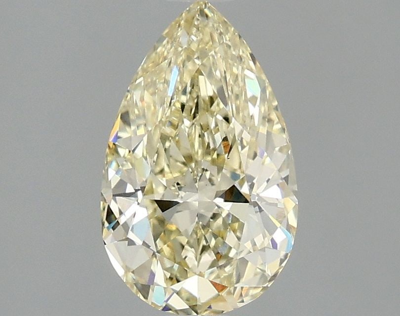 Loose Diamond - PEAR 1.53ct Fancy Yellow VS1: Loose Diamond - PEAR 1.53ct Fancy Yellow VS1 Source: This is a real non-mined Diamond that has been grown in a lab Shape: PEAR Carats: 1.53 Color: Fancy Yellow Certification: IGI Video: