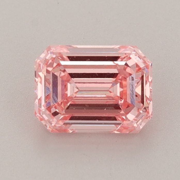 Loose Diamond - EMERALD 0.91ct Fancy Vivid Pink SI1: Loose Diamond - EMERALD 0.91ct Fancy Vivid Pink SI1 Source: This is a real non-mined Diamond that has been grown in a lab Shape: EMERALD Carats: 0.91 Color: Fancy Vivid Pink Certification: IGI Video: