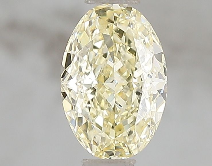 Loose Diamond - OVAL 1.01ct Fancy Yellow VS2: Loose Diamond - OVAL 1.01ct Fancy Yellow VS2 Source: This is a real non-mined Diamond that has been grown in a lab Shape: OVAL Carats: 1.01 Color: Fancy Yellow Certification: IGI Video: