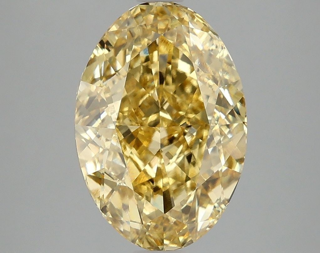 Loose Diamond - OVAL 4.03ct Fancy Vivid Yellow VS2: Loose Diamond - OVAL 4.03ct Fancy Vivid Yellow VS2 Source: This is a real non-mined Diamond that has been grown in a lab Shape: OVAL Carats: 4.03 Color: Fancy Vivid Yellow Certification: IGI Video: