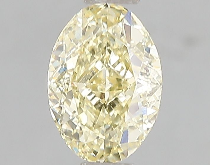 Loose Diamond - OVAL 1.07ct Fancy Yellow VS1: Loose Diamond - OVAL 1.07ct Fancy Yellow VS1 Source: This is a real non-mined Diamond that has been grown in a lab Shape: OVAL Carats: 1.07 Color: Fancy Yellow Certification: IGI Video: