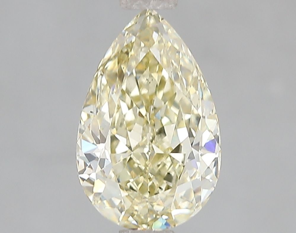 Loose Diamond - PEAR 2.02ct Fancy Yellow SI1: Loose Diamond - PEAR 2.02ct Fancy Yellow SI1 Source: This is a real non-mined Diamond that has been grown in a lab Shape: PEAR Carats: 2.02 Color: Fancy Yellow Certification: IGI Video: