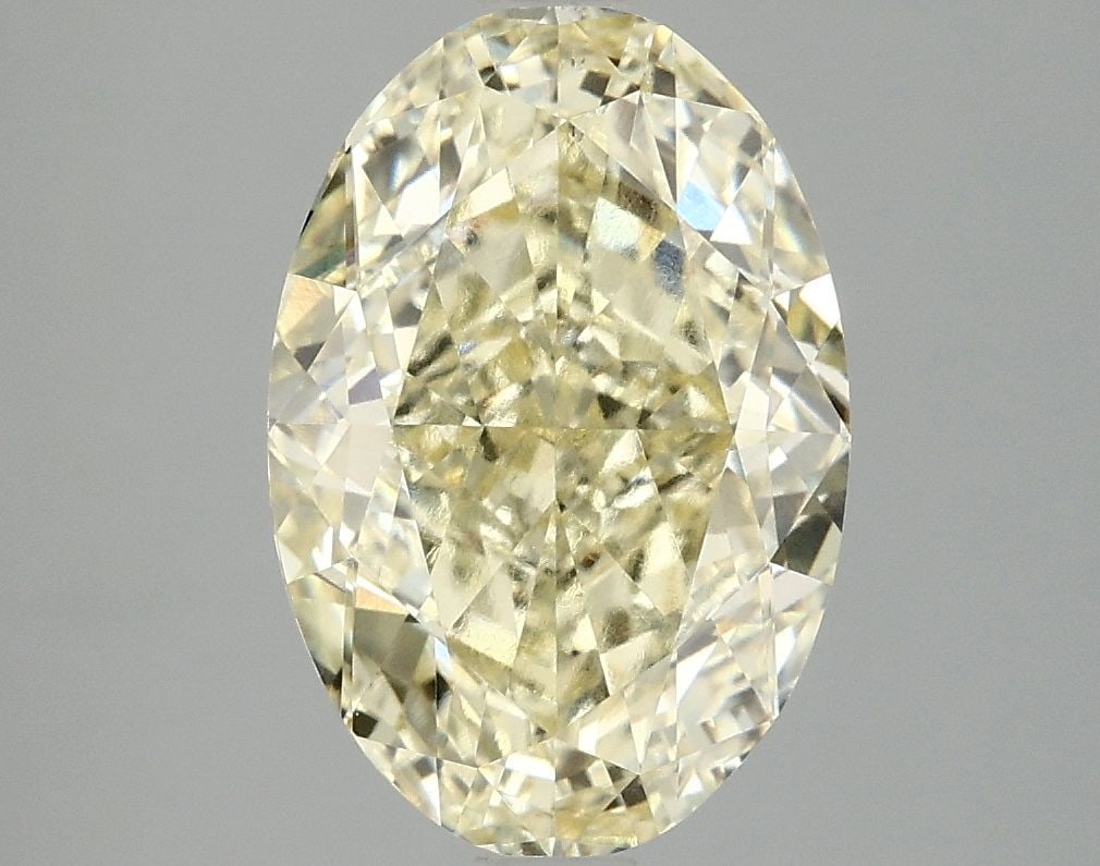 Loose Diamond - OVAL 4.02ct Fancy Yellow VS2: Loose Diamond - OVAL 4.02ct Fancy Yellow VS2 Source: This is a real non-mined Diamond that has been grown in a lab Shape: OVAL Carats: 4.02 Color: Fancy Yellow Certification: IGI Video: