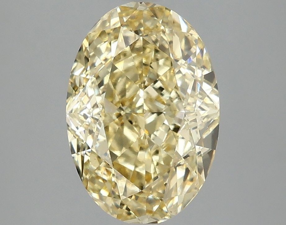 Loose Diamond - OVAL 3.09ct Fancy Vivid Yellow VS1: Loose Diamond - OVAL 3.09ct Fancy Vivid Yellow VS1 Source: This is a real non-mined Diamond that has been grown in a lab Shape: OVAL Carats: 3.09 Color: Fancy Vivid Yellow Certification: IGI Video: