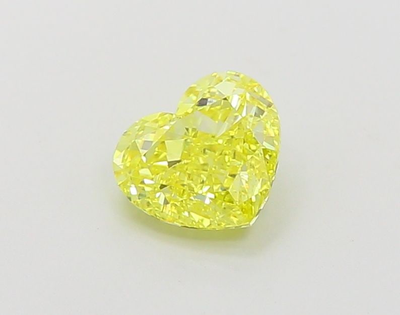 Loose Diamond - HEART 1.07ct Fancy Vivid Yellow VVS2: Loose Diamond - HEART 1.07ct Fancy Vivid Yellow VVS2 Source: This is a real non-mined Diamond that has been grown in a lab Shape: HEART Carats: 1.07 Color: Fancy Vivid Yellow Certification: IGI Video: