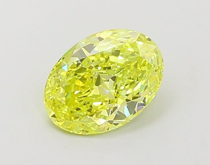 Loose Diamond - OVAL 1.03ct Fancy Vivid Yellow VVS2: Loose Diamond - OVAL 1.03ct Fancy Vivid Yellow VVS2 Source: This is a real non-mined Diamond that has been grown in a lab Shape: OVAL Carats: 1.03 Color: Fancy Vivid Yellow Certification: IGI Video: