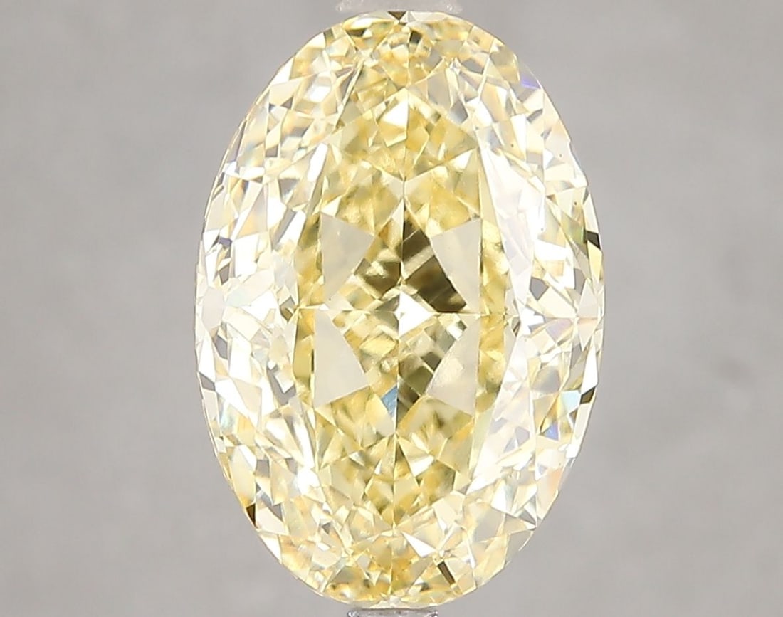 Loose Diamond - OVAL 5.06ct Fancy Vivid Yellow VS1: Loose Diamond - OVAL 5.06ct Fancy Vivid Yellow VS1 Source: This is a real non-mined Diamond that has been grown in a lab Shape: OVAL Carats: 5.06 Color: Fancy Vivid Yellow Certification: IGI Video: