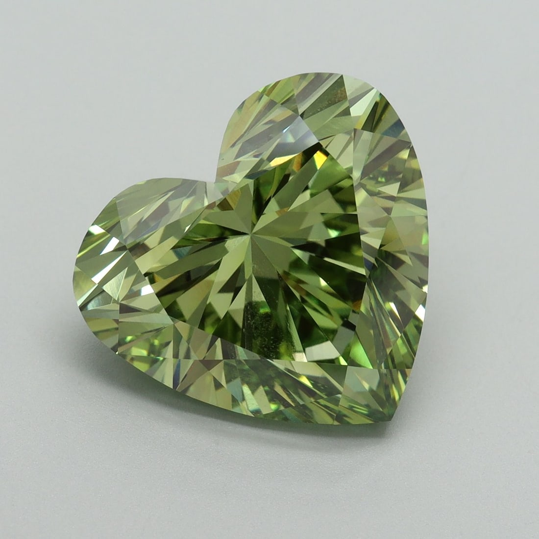 Loose Diamond - HEART 9.13ct Fancy Vivid Green VS1: Loose Diamond - HEART 9.13ct Fancy Vivid Green VS1 Source: This is a real non-mined Diamond that has been grown in a lab Shape: HEART Carats: 9.13 Color: Fancy Vivid Green Certification: IGI Video: