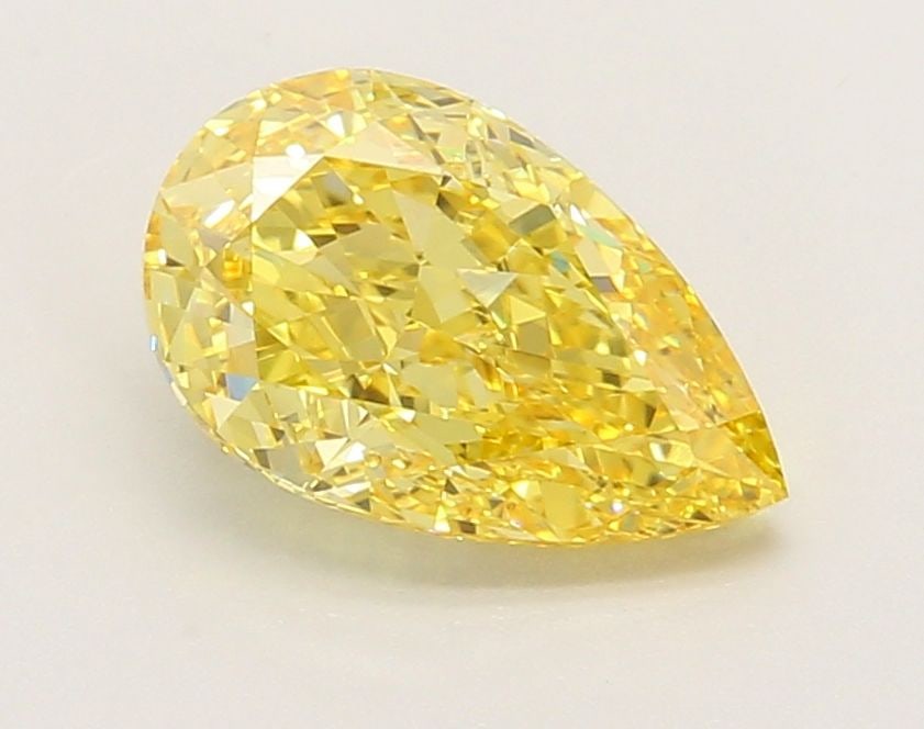 Loose Diamond - PEAR 1.76ct Fancy Vivid Yellow VS1: Loose Diamond - PEAR 1.76ct Fancy Vivid Yellow VS1 Source: This is a real non-mined Diamond that has been grown in a lab Shape: PEAR Carats: 1.76 Color: Fancy Vivid Yellow Certification: IGI Video: