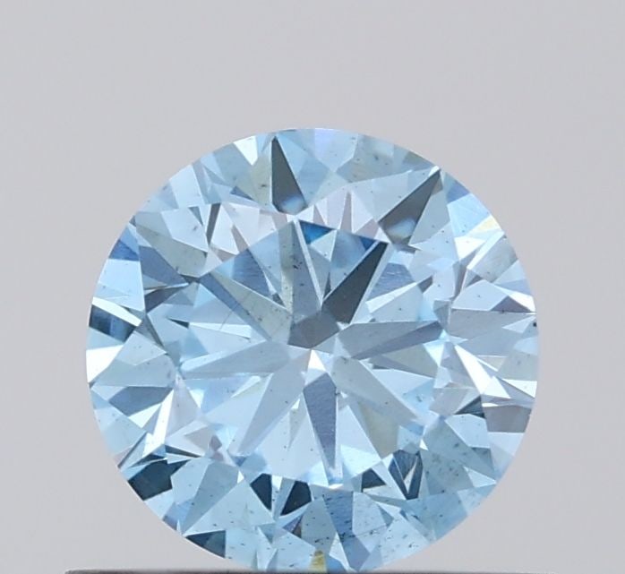 Loose Diamond - ROUND 0.58ct Fancy Vivid Blue VS2: Loose Diamond - ROUND 0.58ct Fancy Vivid Blue VS2 Source: This is a real non-mined Diamond that has been grown in a lab Shape: ROUND Carats: 0.58 Color: Fancy Vivid Blue Certification: IGI Video: