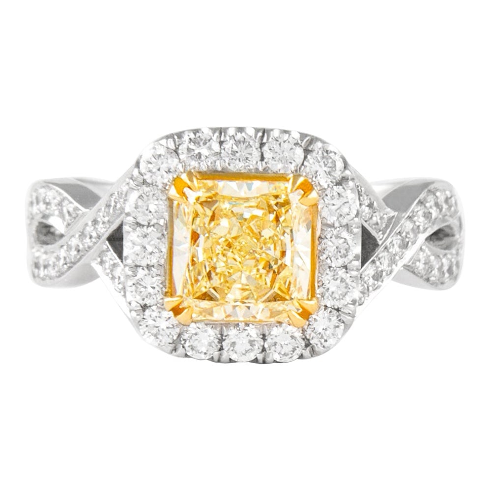 1.25ct Fancy Intense Yellow Diamond Ring 18k EGL Certified: 1.25ct Fancy Intense Yellow Diamond Ring 18k EGL Certified This exquisite ring features a stunning 1.25ct Fancy Intense Yellow VS1 Radiant diamond, set in a contemporary two-tone design crafted from 1