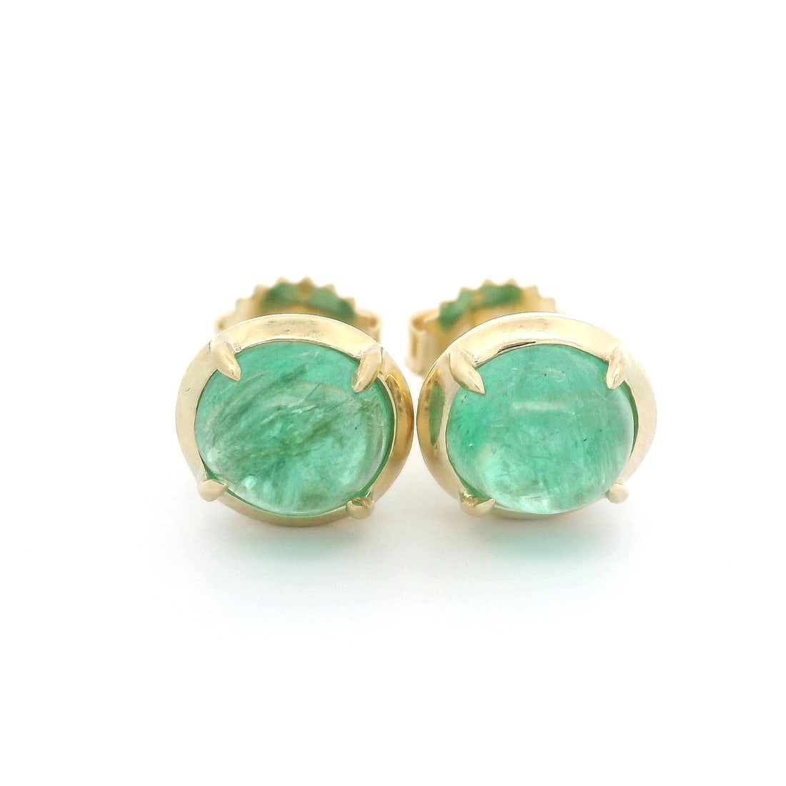 New 14k Yellow Gold 2.82ct Oval Emerald Stud Earrings: New 14k Yellow Gold 2.82ct Oval Emerald Stud Earrings Elevate your accessory collection with these stunning custom 14k yellow gold stud earrings featuring lively oval emeralds. Each earring showcases