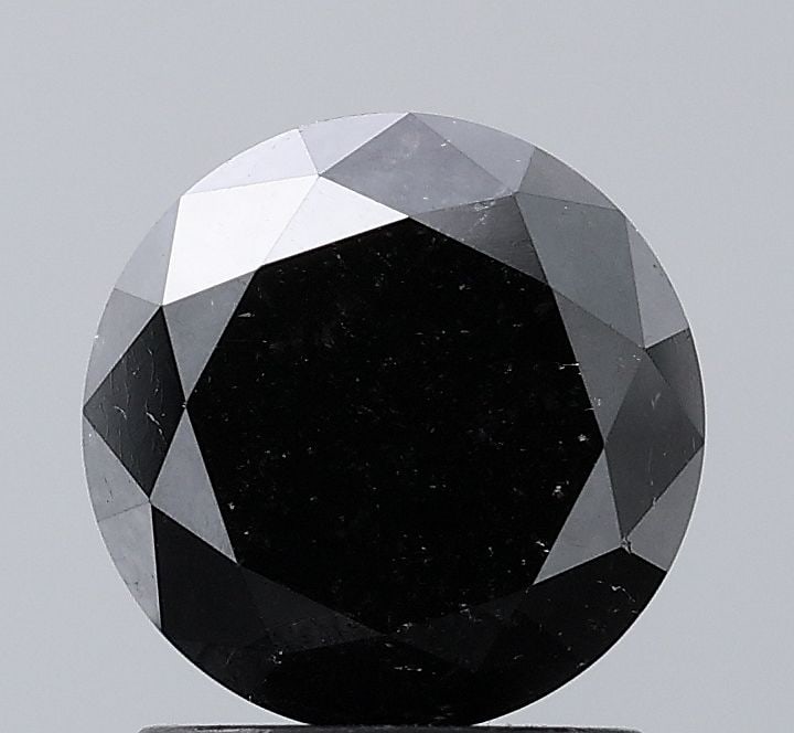 Loose Diamond - ROUND 1.78ct Fancy Black VS1: Loose Diamond - ROUND 1.78ct Fancy Black VS1 Source: Natural Shape: ROUND Carats: 1.78 Color: Fancy Black Certification: NONE Video:
