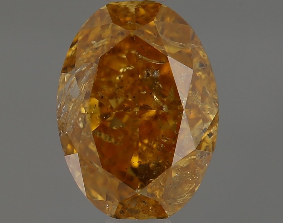 Loose Diamond - OVAL 1.0ct Fancy Vivid Yellow Orange I2: Loose Diamond - OVAL 1.0ct Fancy Vivid Yellow Orange I2 Source: Natural Shape: OVAL Carats: 1.0 Color: Fancy Vivid Yellow Orange Certification: GIA Video: