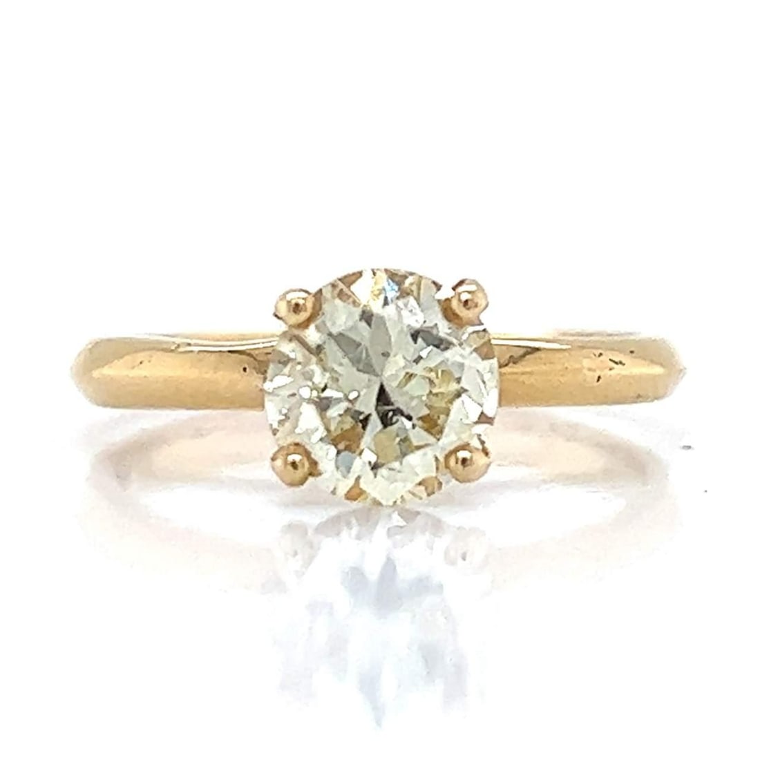 1960's 18K Yellow Gold Fancy Light Yellow Diamond Ring 1.35 Ct: 1960's 18K Yellow Gold Fancy Light Yellow Diamond Ring 1.35 Ct This stunning 1960's ring features a beautiful 1.35 Ct. Fancy Light Yellow Diamond, expertly set in luxurious 18K yellow gold. The diamon