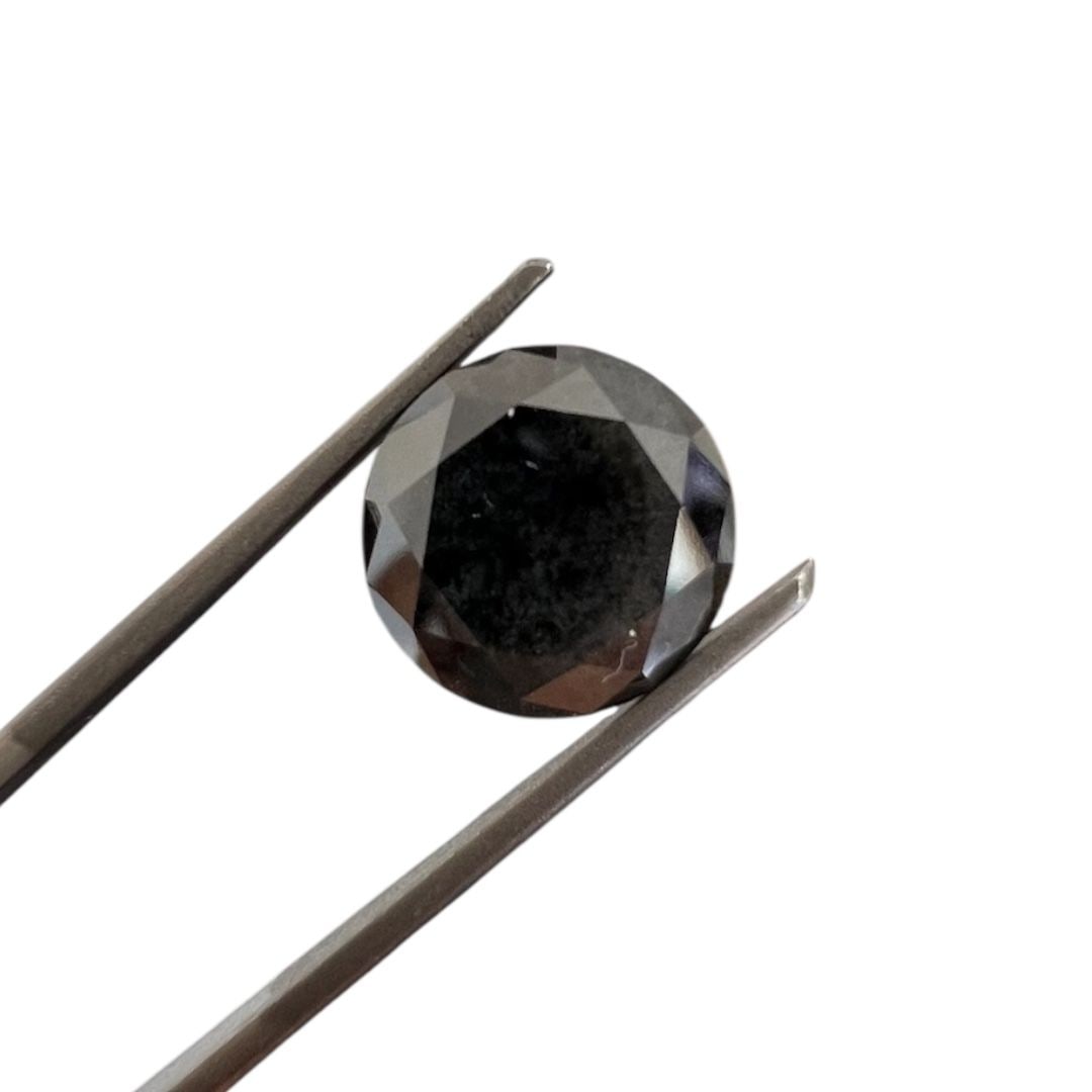 Loose Diamond - ROUND 5.25ct Fancy Black: Loose Diamond - ROUND 5.25ct Fancy Black Source: Natural Shape: ROUND Carats: 5.25 Color: Fancy Black Certification: GIA PLEASE NOTE: Framed, Large, or heavy items do not have shipping costs included.
