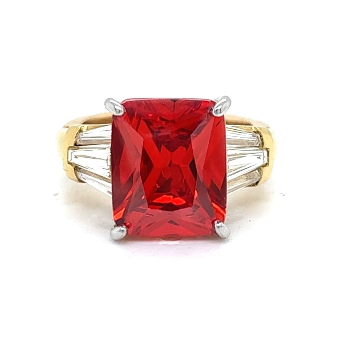 18K Yellow Gold Mandarin Garnet 6Ct & Diamond Ring: 18K Yellow Gold Mandarin Garnet 6Ct & Diamond Ring This stunning 18K Yellow Gold ring features a vibrant Mandarin Garnet weighing approximately 6.00 Ct, complemented by six sparkling diamonds totaling