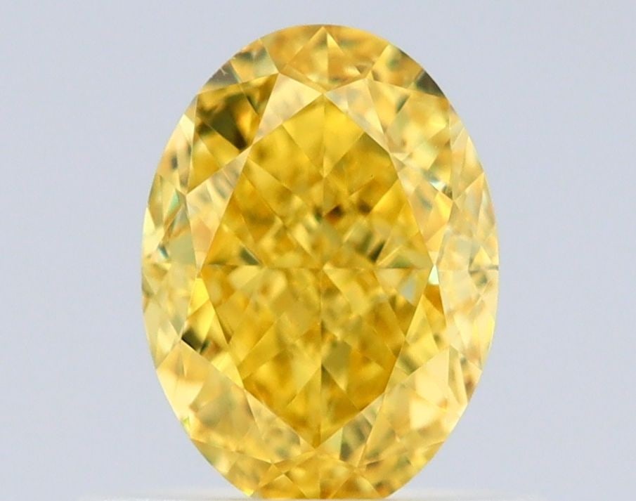 Loose Diamond - OVAL 0.73ct Fancy Vivid Yellow VS1: Loose Diamond - OVAL 0.73ct Fancy Vivid Yellow VS1 Source: Natural Shape: OVAL Carats: 0.73 Color: Fancy Vivid Yellow Certification: GIA Video: