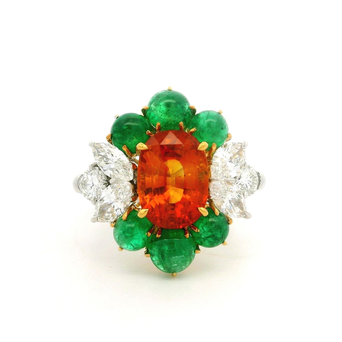 GIA Certified 7.73ct Vivid Orange Sapphire Emerald Diamond Ring: GIA Certified 7.73ct Vivid Orange Sapphire Emerald Diamond Ring Introducing a stunning cocktail ring featuring a vibrant combination of natural gemstones. At its center lies a magnificent natural genu