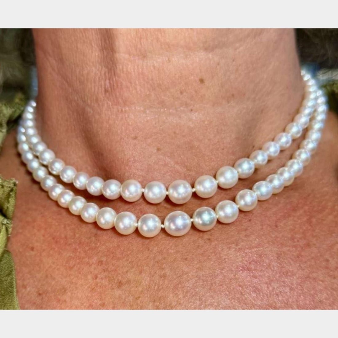 GIA Certified Cultured Pearl Necklace in 14K White Gold 1950s: GIA Certified Cultured Pearl Necklace in 14K White Gold 1950s This 1950s necklace features GIA certified cultured pearls set in 14K white gold. The necklace has a total weight of 37.8 grams and