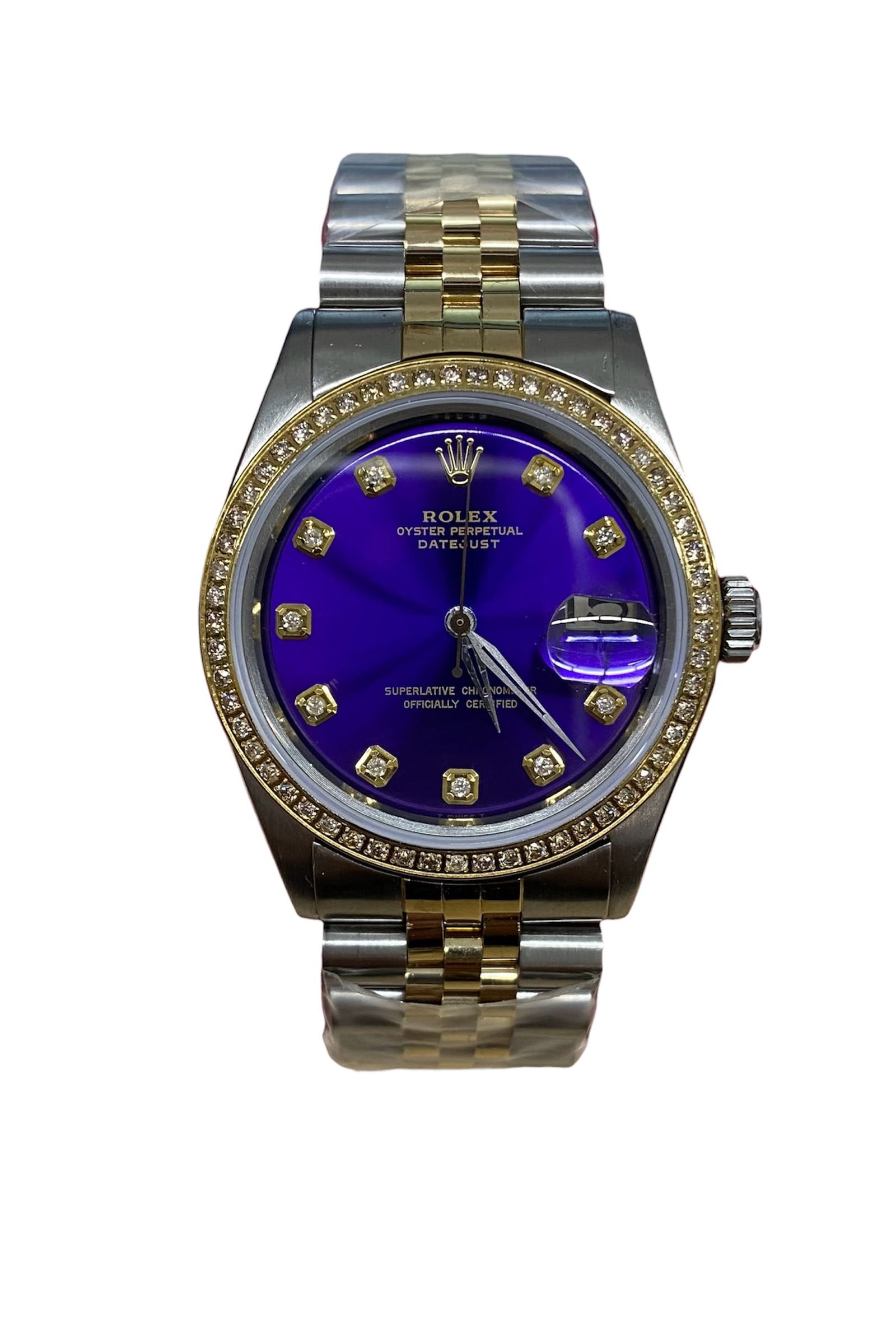 Champagne Diamond Dial Datejust Reference 1601 with Aftermarket Jubilee Bracelet: Champagne Diamond Dial Datejust Reference 1601 with Aftermarket Jubilee Bracelet This Rolex Datejust features a champagne dial adorned with diamond markers and is paired with an aftermarket Jubilee br