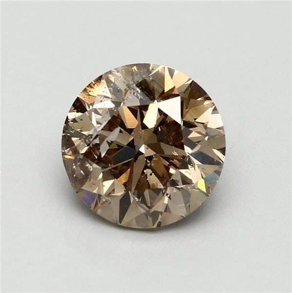 Loose Diamond - ROUND 5.02ct Fancy Yellow Brown: Loose Diamond - ROUND 5.02ct Fancy Yellow Brown Source: Natural Shape: ROUND Carats: 5.02 Color: Fancy Yellow Brown Certification: GIA Video: