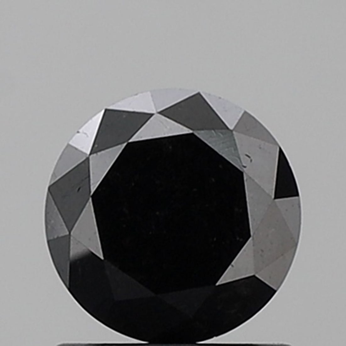 Loose Diamond - ROUND 1.21ct Black VVS2: Loose Diamond - ROUND 1.21ct Black VVS2 Source: Natural Shape: ROUND Carats: 1.21 Color: Black Certification: NONE Video: