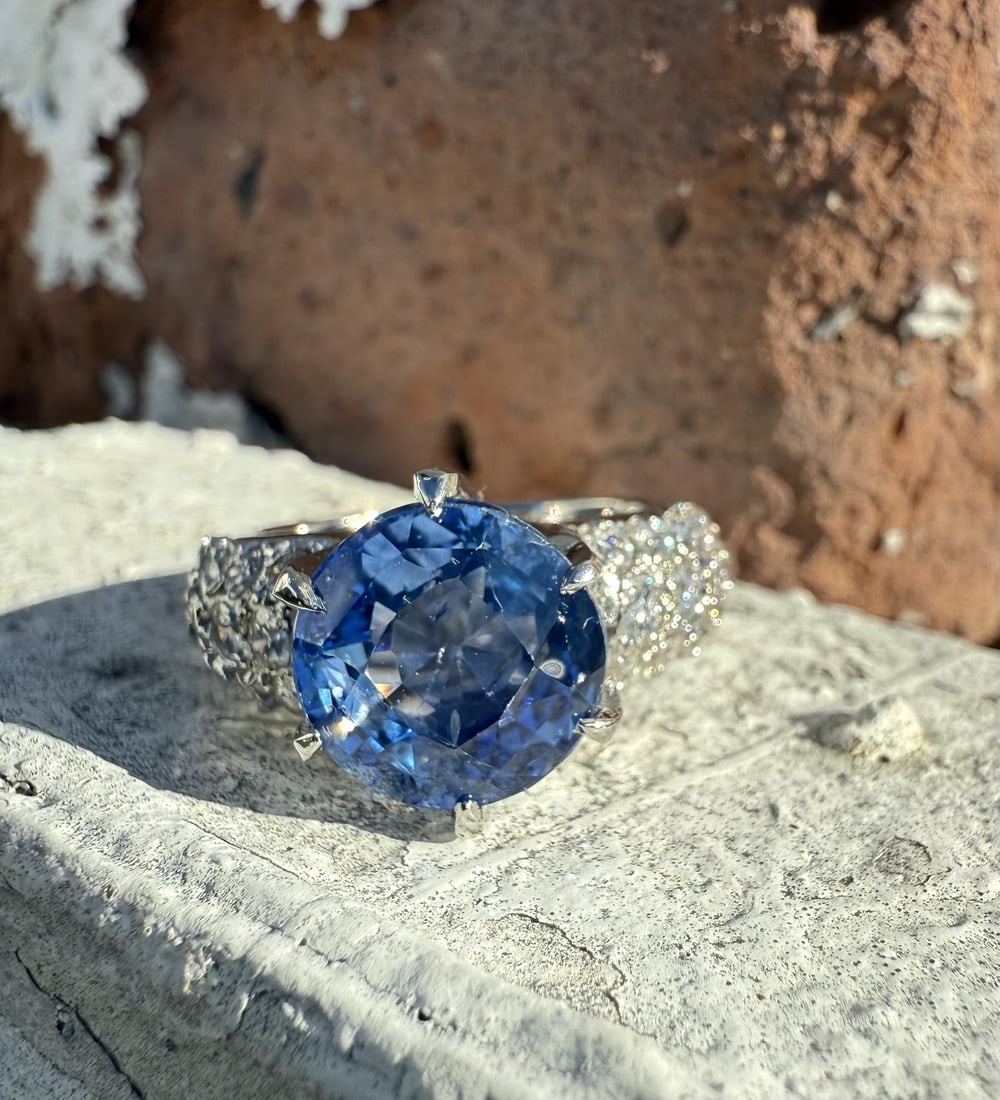 Platinum 7.85ctw GIA Ceylon No Heat Sapphire Diamond Cocktail Ring: Platinum 7.85ctw GIA Ceylon No Heat Sapphire Diamond Cocktail Ring This stunning platinum cocktail ring features a magnificent 7.85 carat total weight, showcasing a natural, round brilliant cut Ceylon