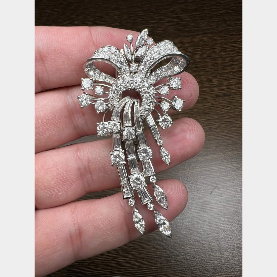 1950's Platinum Diamond Brooch 11.00 Ct F-G VVS-VS 2.5 Inches: 1950's Platinum Diamond Brooch 11.00 Ct F-G VVS-VS 2.5 Inches This exquisite 1950's Platinum Diamond Brooch showcases a stunning total of 11.00 Ct. of diamonds. It features 7 Marquise diamonds weighin