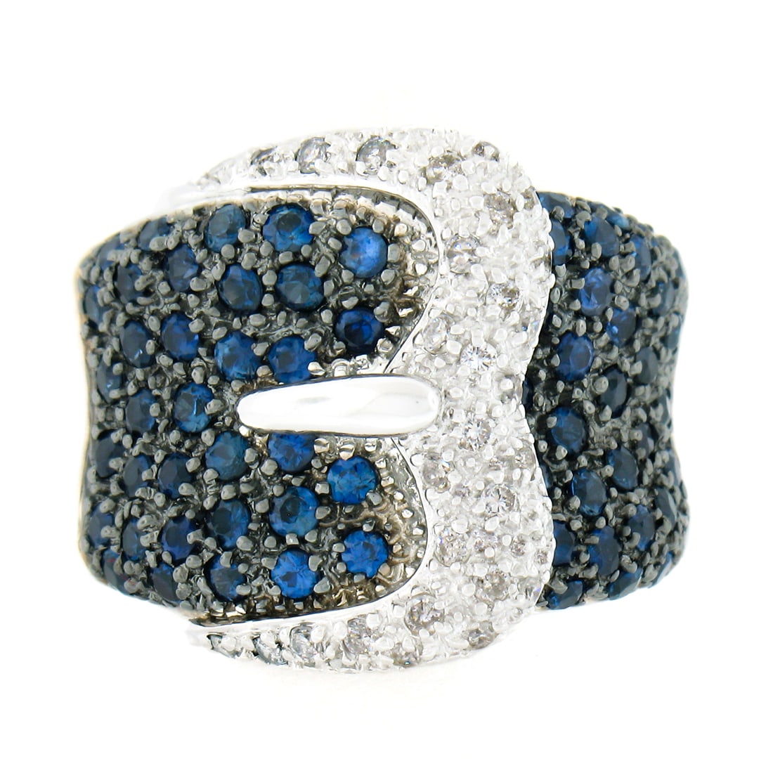 Levian 18k White Gold 1.80ctw Pave Sapphire & Diamond Buckle Ring: Levian 18k White Gold 1.80ctw Pave Sapphire & Diamond Buckle Ring This stunning Levian buckle ring is crafted from solid 18k white gold and features a captivating design adorned with both sapphires an