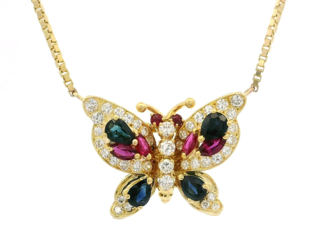Vintage 18k Yellow Gold Butterfly Pendant Necklace with Sapphire Ruby Diamonds: Vintage 18k Yellow Gold Butterfly Pendant Necklace with Sapphire Ruby Diamonds This exquisite Vintage Yellow Gold Butterfly Pendant Necklace showcases a stunning blend of natural gemstones and intrica